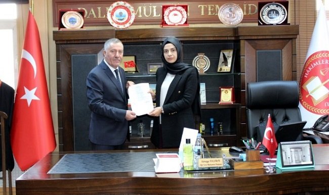 ESOB BAŞKANI ALİHANOĞLU MAZBATASINI ALDI